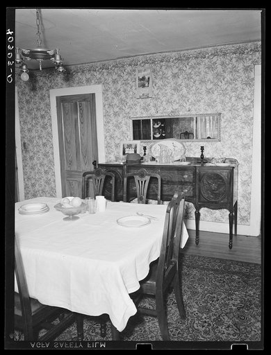 Rockville, Tolland County, Connecticut. The dining room in the house on the farm of John Schneider. Mr. Schnieder suffered from the hurricane, and is a FSA (Farm Security Administration) client