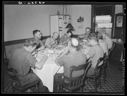 Lancaster County, Pennsylvania. Enos Royer and hired hands having dinner on the Enos Royer farm
