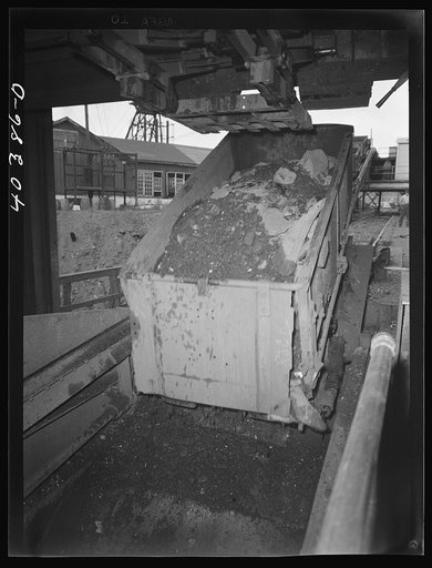 Gilberton, Pennsylvania. A car of coal, straight from the Maple Hill mine near Shenandoah, being dumped into the Saint Nicholas breaker