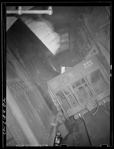 Gilberton, Pennsylvania. A carload of coal being dumped into the Saint Nicholas breaker, one of the two largest in the world