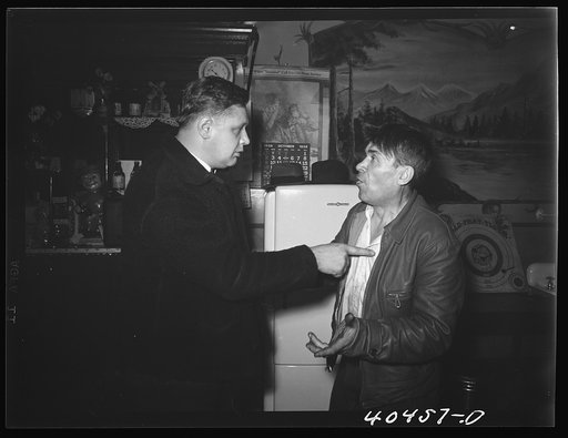 Shenandoah, Pennsylvania. Two miners in Filipek's bar having an argument