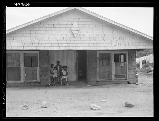 Old garage used for a dwelling by a Negro family. Outskirts of Graham, North Carolina