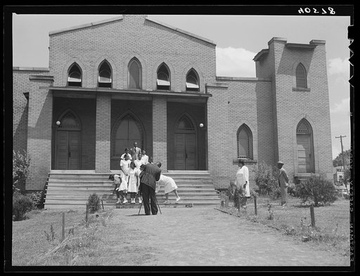 The ushers of a Negro church have their photograph taken to be sold in order to raise money for the church. Durham, North Carolina