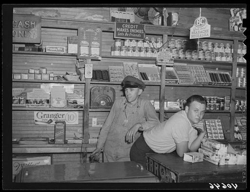 Interior of Mr. Coley's store. Mr. Coley is standing with his helper. Stem, Granville County, North Carolina