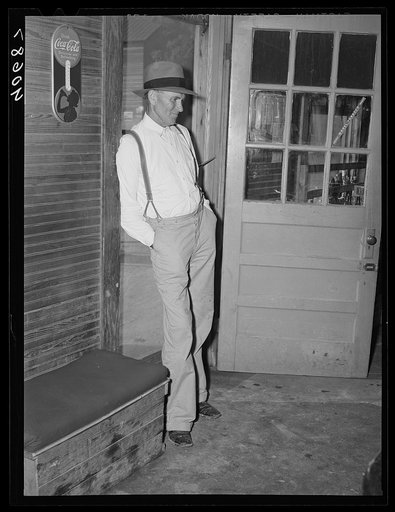 Farmer watching game in poolroom at Stem, Granville County, North Carolina