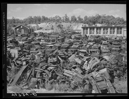 "We wreck anything!"  Auto graveyard near Sulphur Springs, Maryland, on U.S. Highway No. 1