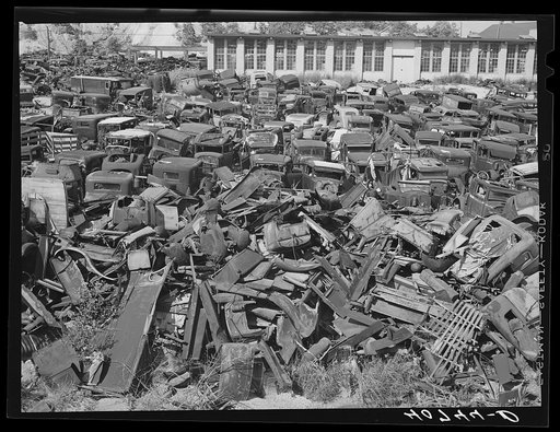 Untitled photo, possibly related to: "We wreck anything!" Auto graveyard near Sulphur Springs, Maryland, on U.S. Highway No. 1