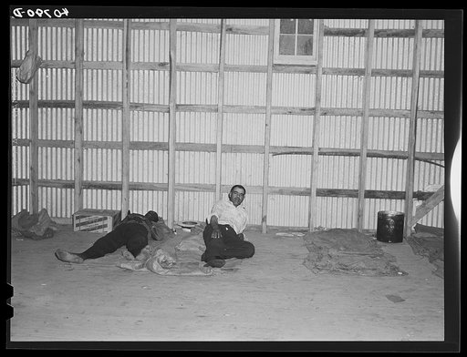 This warehouse constitutes the sleeping quarters for a group of Florida potato pickers