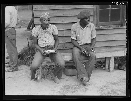 Florida migrants having lunch at camp near Old Trap, North Carolina