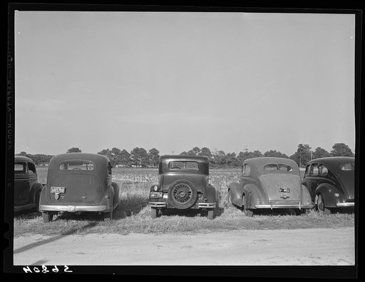 Cars of migratory tomato wrappers. Kings Creek, Maryland