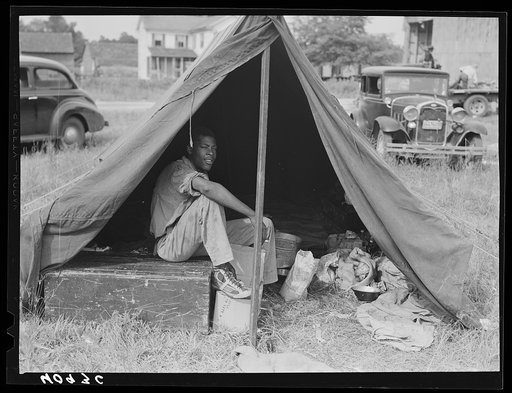 Florida migrant with a group who had their own tent which they pitched outside the grading station at Belcross, North Carolina
