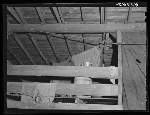 Untitled photo, possibly related to: Cooking facilities for migratory agricultural workers living in the attic of a potato grading station at Belcross, North Carolina