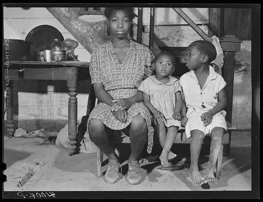 Three of the thirteen children of William Sanders, Negro farmer who has only recently begun receiving FSA (Farm Security Administration) aid. Saint Inigoes, Maryland