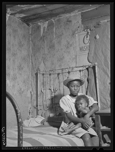Two of the eleven children of Edward Gont, one of the newer FSA (Farm Security Administration) clients, who still has a great deal of improving to do. Dameron, Maryland