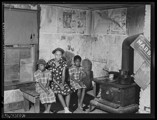 Three of the thirteen children of William Sanders, Negro farmer who has only recently begun receiving FSA (Farm Security Administration) aid. Saint Inigoes, Maryland