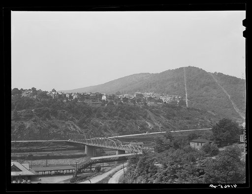 Untitled photo, possibly related to: View of upper Mauch Chunk from East Mauch Chunk. In the background is Mount Pisgah and the second cut in the mountain from the right is the remains of the old switchback