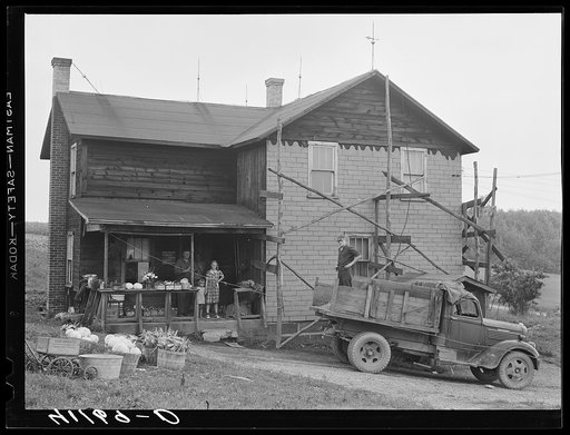 Untitled photo, possibly related to: Loading produce to be taken to Tri-County Farmers Co-op Market in Du Bois, Pennsylvania, at the Knees farm near Penfield, Pennsylvania
