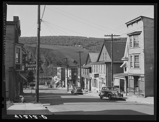 Untitled photo, possibly related to: Street in the important anthracite town of Coaldale, Pennsylvania, showing huge coal bank in background