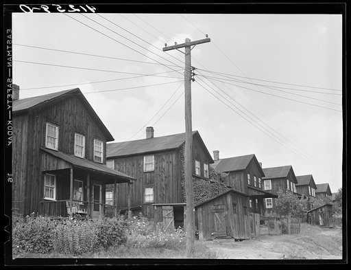 Characteristic black houses with white windows in Force, Pennsylvania