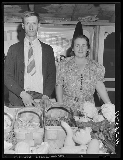 Mr. and Mrs. Bundy at their booth at the Tri-County Farmers Co-op Market at Du Bois, Pennsylvania