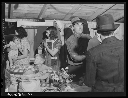 Farm family at Tri-County Farmers Co-op Market at Du Bois, Pennsylvania