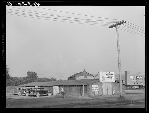 Wooden structure housing the Tri-County Farmers Co-op Market at Du Bois, Pennsylvania. They hope in time to be able to erect a brick building
