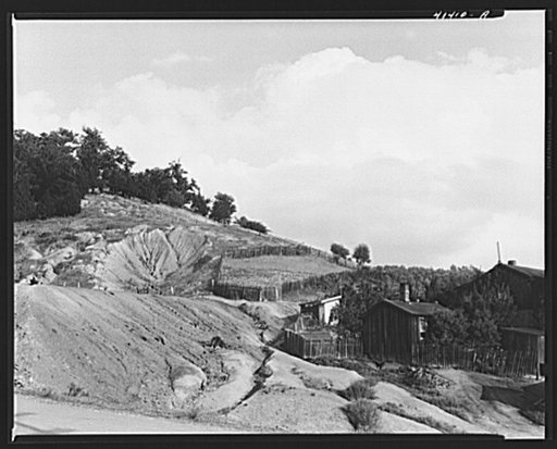House and ancient slagpile in Coal Hollow, Pennsylvania, about twelve miles south of Saint Mary's Pennsylvania