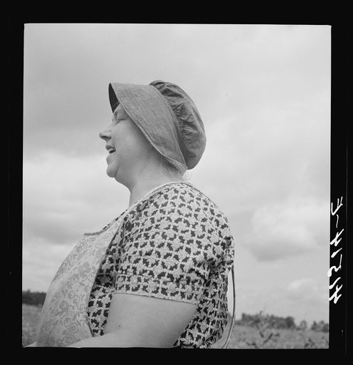 Untitled photo, possibly related to: Farm woman was working in fields along Route 79, just outside Ithaca, New York