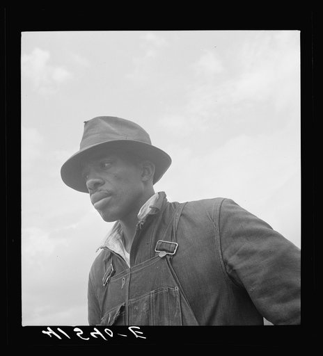 Untitled photo, possibly related to: Mr. Miller, farmer and minister. He is the only Negro farmer in the submarginal area of Rumsey Hill, near Erin, New York. He came about seven years ago after having farmed in Tennessee and New Jersey. His farm is on the very crest of the hill and he is doing a li