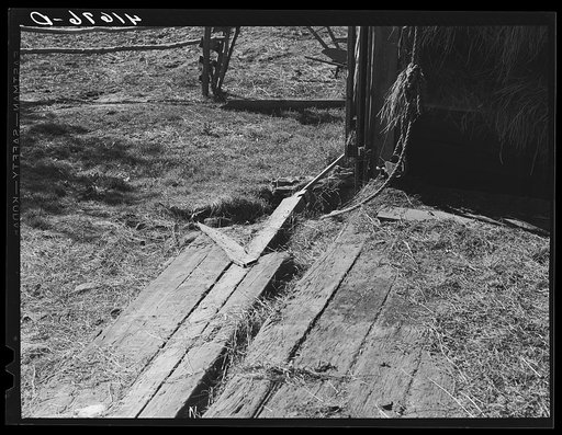 Dangerous entrance to barn on a farm near North Branford, Connecticut (safety film)