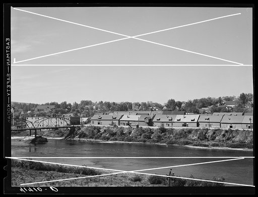 "Track storage." Most of the bigger companies store their potatoes in these storage barns. This group is along the Aroostook river in Caribou, Maine