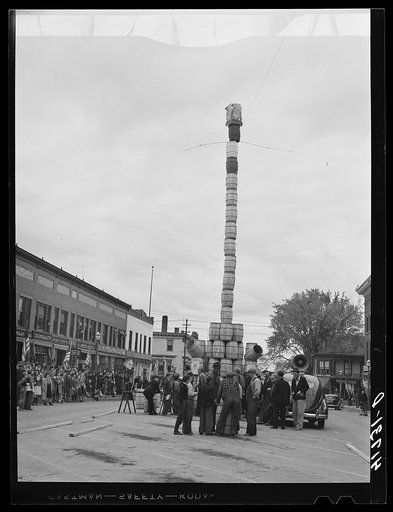 The "Pototem pole" standing in the main street of Presque Isle as an advertising stunt for the barrel rolling contest in Presque Isle, Maine