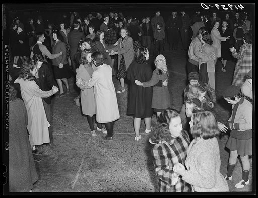 The evening program after the Barrel Rolling Contest consisted of dancing in the street (plenty of jitterbugging). Presque Isle, Maine