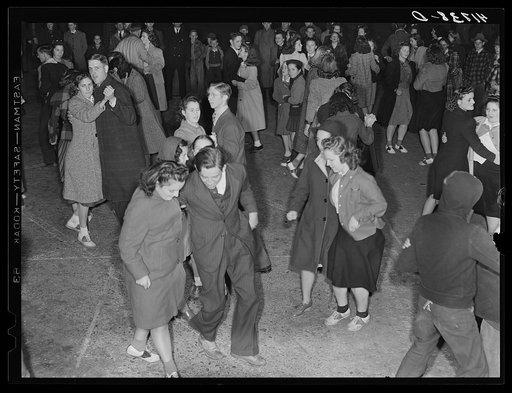 The evening program after the Barrel Rolling Contest consisted of dancing in the street (plenty of jitterbugging). Presque Isle, Maine