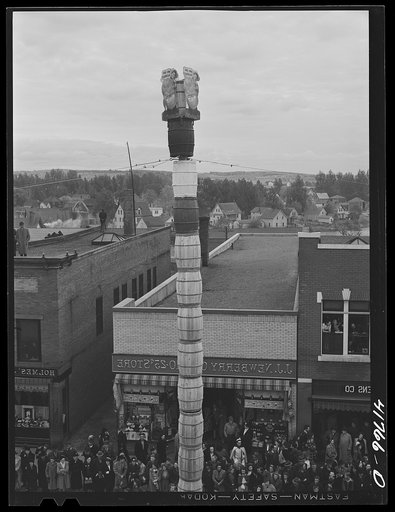 The "Pototem" pole standing in the main street of Presque Isle, Maine, as an advertisement for the barrel rolling contest