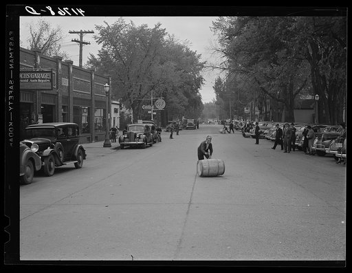 Untitled photo, possibly related to: One of the winners of the boy's race at the barrel rolling contest in Presque Isle, Maine