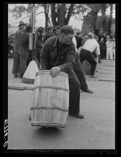 The start of the final heat in the men's race at the barrel rolling contest in Presque Isle, Maine