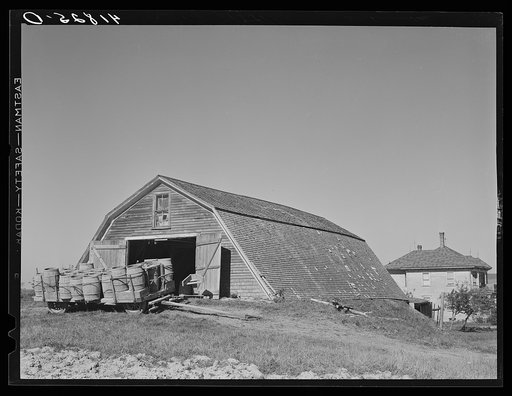 Untitled photo, possibly related to: Potato storage barn on a field near Caribou, Maine. The earth is built up around the sides to provide a more even temperature throughout the year