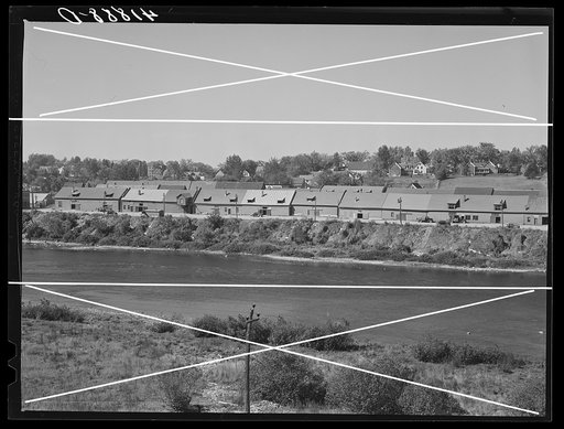 Track storage. Most big companies store their potatoes in these barns along Aroostook River in Caribou, Maine