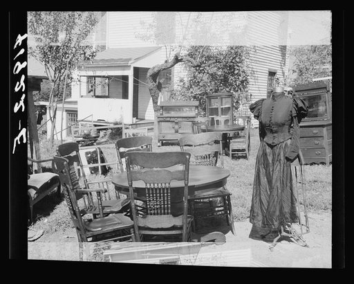 Untitled photo, possibly related to: Furniture and old dress model auctioned off at the auction of Mr. Anthony Yacek's farm and household goods. Derby, Connecticut