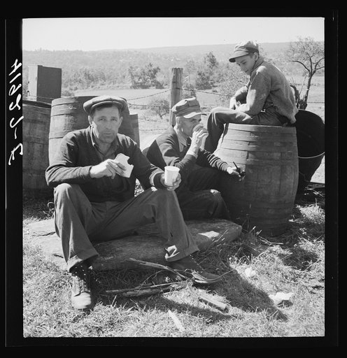 Customers at the auction sale of Mr. Anthony Yacek's farm, taking time out for some lunch. Derby, Connecticut