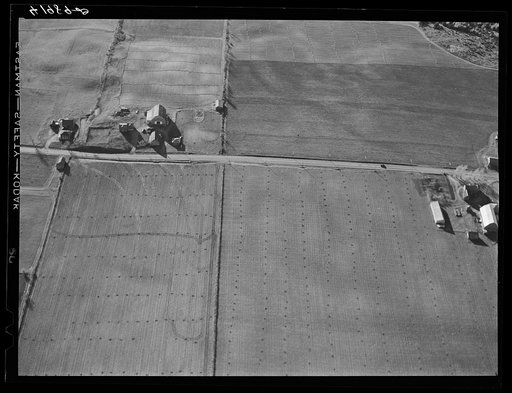 Potato farm after the harvest showing layout of buildings. The highway running thru is U.S. No. 1. Near Caribou, Maine