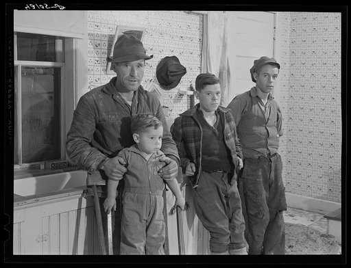 Mr. Baptiste Jendreau and his children. He runs a small potato farm near Saint David, Maine, with the help of the two older boys
