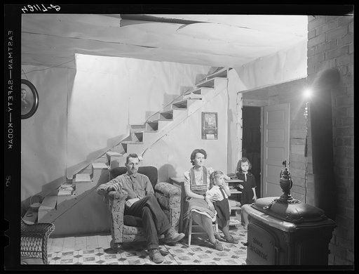 Untitled photo, possibly related to: Mr. and Mrs. Lindore Labbee and their children in their newly-built home. Mr. Labbe, FSA (Farm Security Administration) client, runs a small seed foundation unit in Wallagrass, Maine