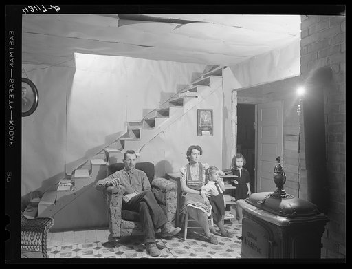 Untitled photo, possibly related to: Mr. and Mrs. Lindore Labbee and their children in their newly-built home. Mr. Labbe, FSA (Farm Security Administration) client, runs a small seed foundation unit in Wallagrass, Maine