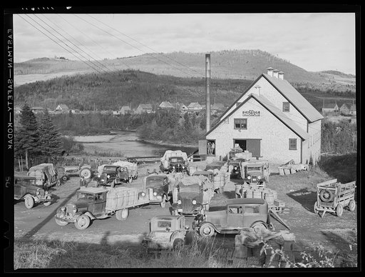 Farmers with their trucks waiting outside a starch factory in Fort Kent, Maine. Many of them have been there for over twenty-four hours waiting for their potatoes to be graded and weighed