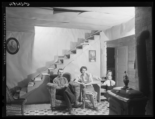 Mr. and Mrs. Lindore Labbee and their children in their newly-built home. Mr. Labbe, FSA (Farm Security Administration) client, runs a small seed foundation unit in Wallagrass, Maine
