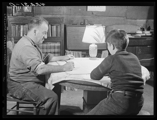 Canterbury, Connecticut. Nov. 1940. Mr. George Howe and one of his sons.  His house was destroyed by the hurricane and he now lives in the cellar, the only part of his house that remains