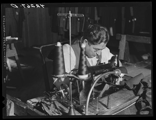 A sewing machine operator at "Levine & Levine" ladies coats who also runs a small farm near Colchester, Connecticut