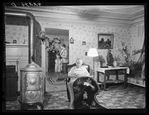In the home of Steve Dino, Italian FSA (Farm Security Administration) client near Canterbury, Connecticut. His mother sells hooked rugs to suppliment their farm income